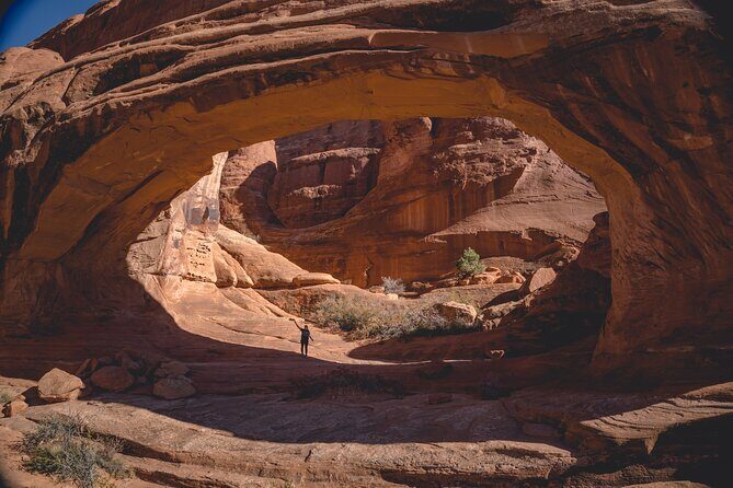 Arches Full Day Small Group Tour & Hike - Delicate Arch: the 3-mile round trip with Wolfe Ranch and petroglyphs
