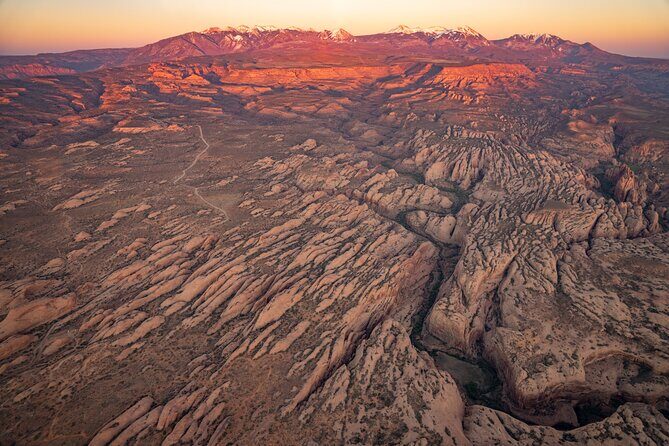 Canyon Country Sunset Helicopter Tour - 60 minutes - Golden canyon walls: the first wow moment in flight