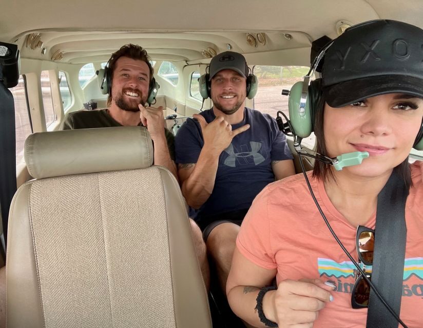 Moab: Arches National Park Airplane Tour - Seats, headsets, and camera prep for window-seat photography